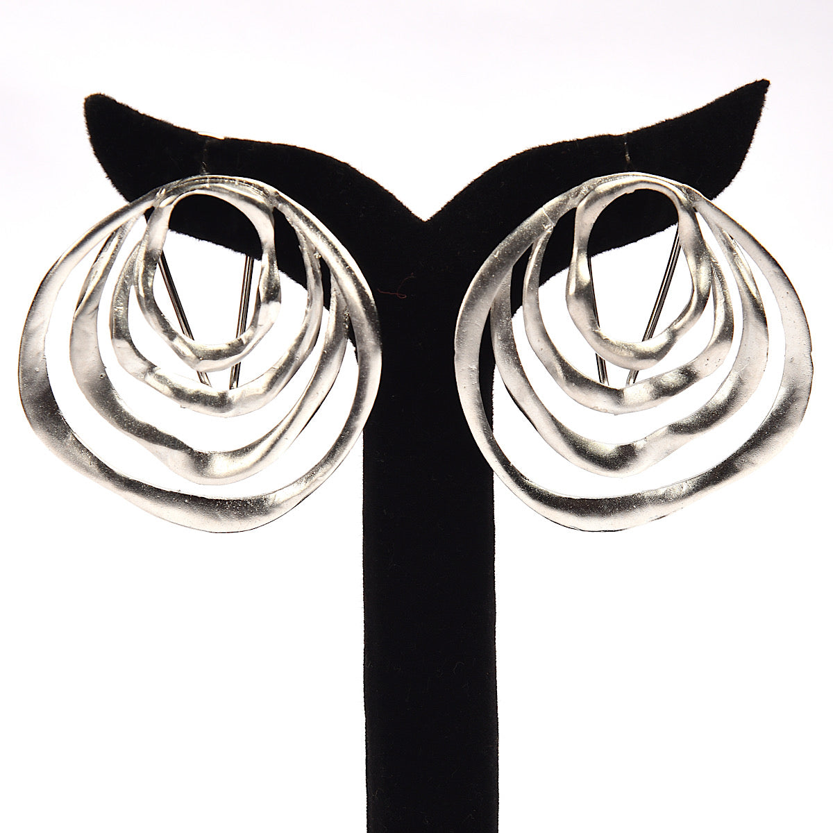 Oozi Earrings.