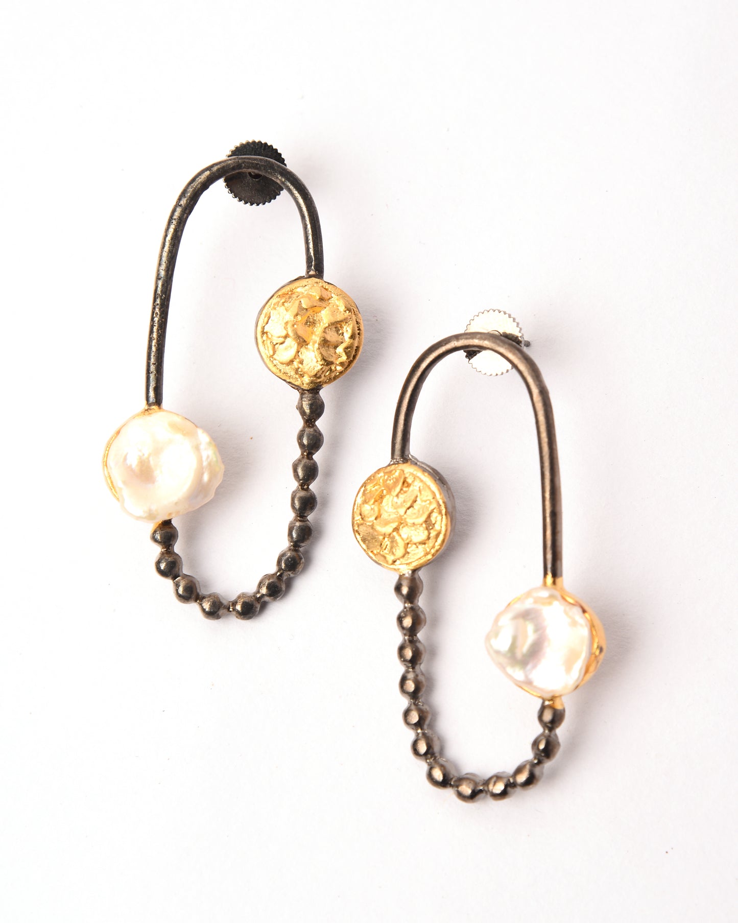 Nomi Earrings.