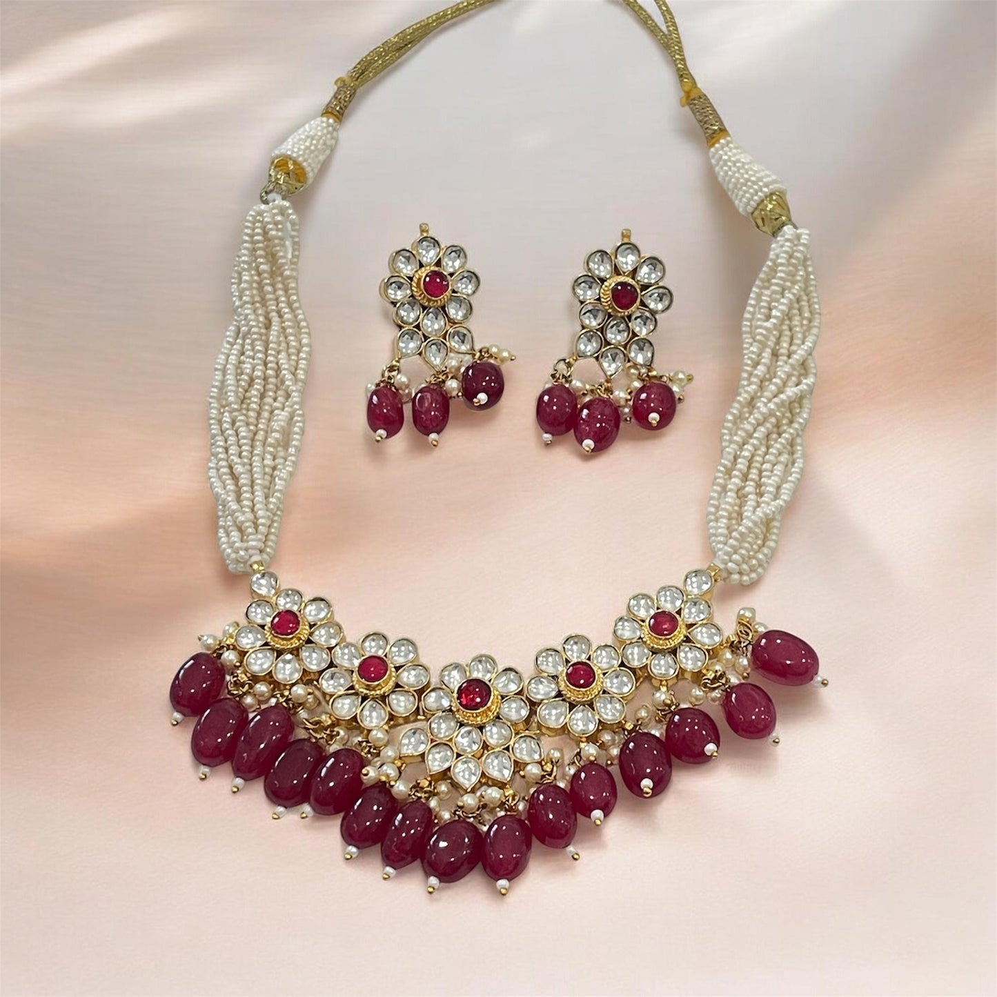Sia Tyani Kundan Set