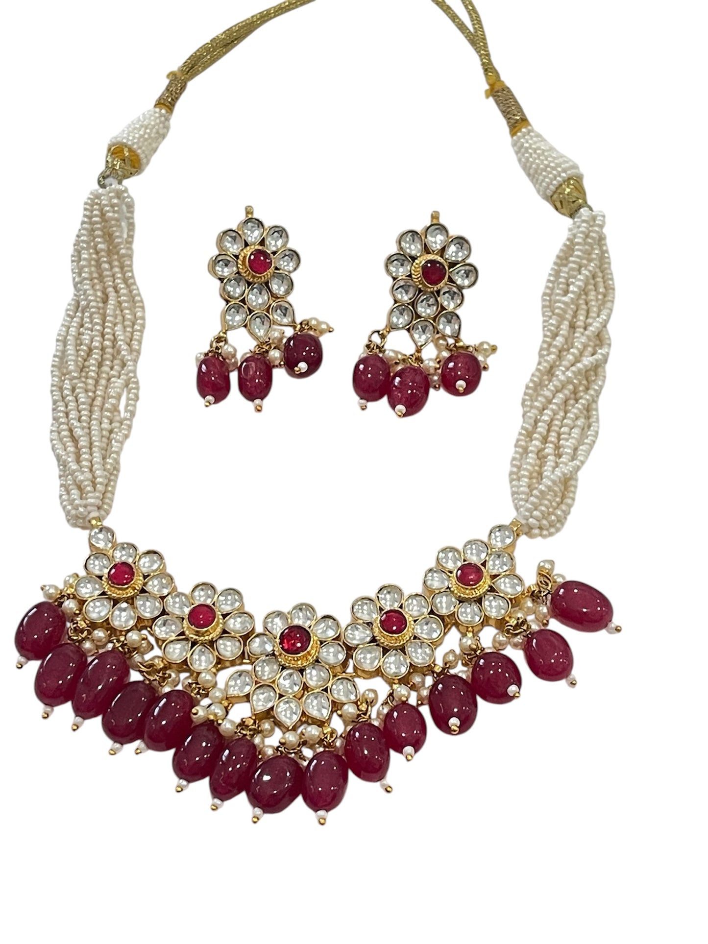 Sia Tyani Kundan Set
